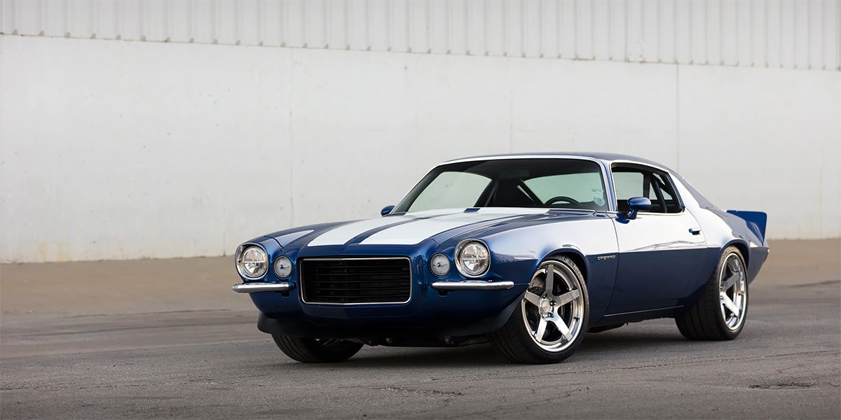 Car drives on dirt road