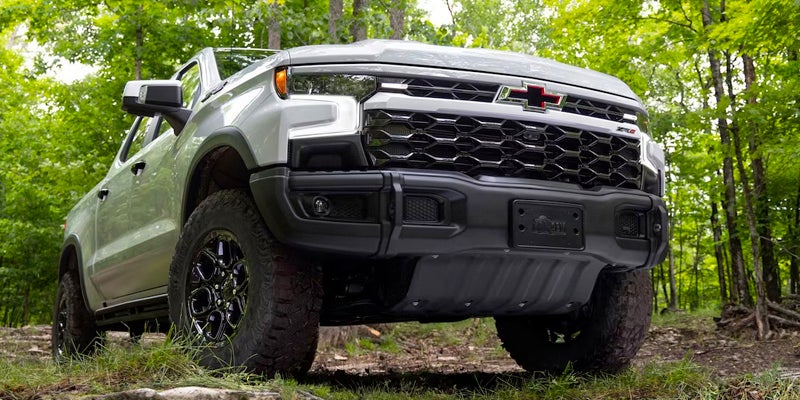 Chevrolet Silverado ZR2 pickup truck, front view, off-road in a forest